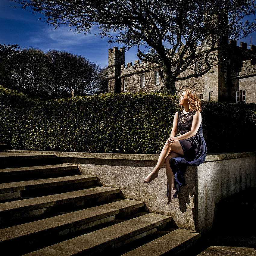 Girl in sunlight outside Tregenna Castle Hotel in Cornwall